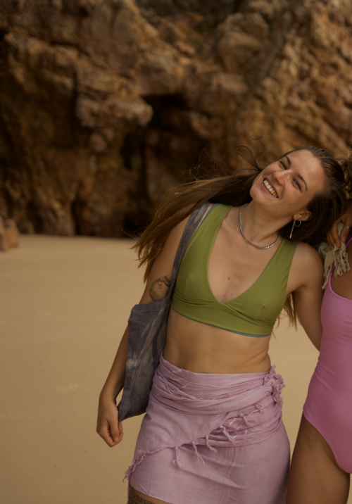 Sustainable two-piece bikini in forest green with a contrasting blue reversible design, crafted from ECONYL® regenerated nylon. A sustainable V-neck bikini top and an eco-friendly high waist bikini bottom.