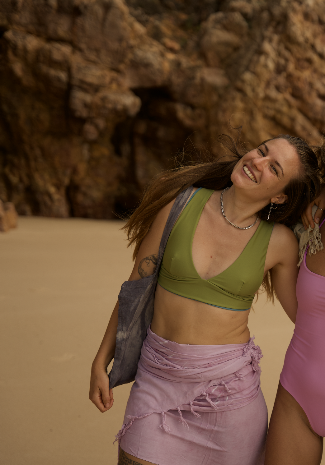Sustainable two-piece bikini in forest green with a contrasting blue reversible design, crafted from ECONYL® regenerated nylon. A sustainable V-neck bikini top and an eco-friendly high waist bikini bottom.