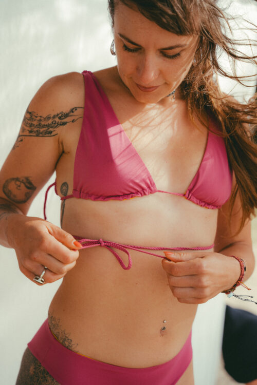 Reversible multiway triangle bikini top in dark pink and warm yellow by COCOU